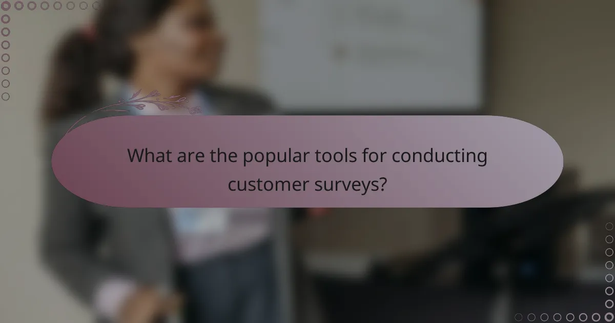 What are the popular tools for conducting customer surveys?